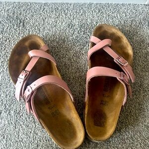 Dusty pink Birkenstocks.
